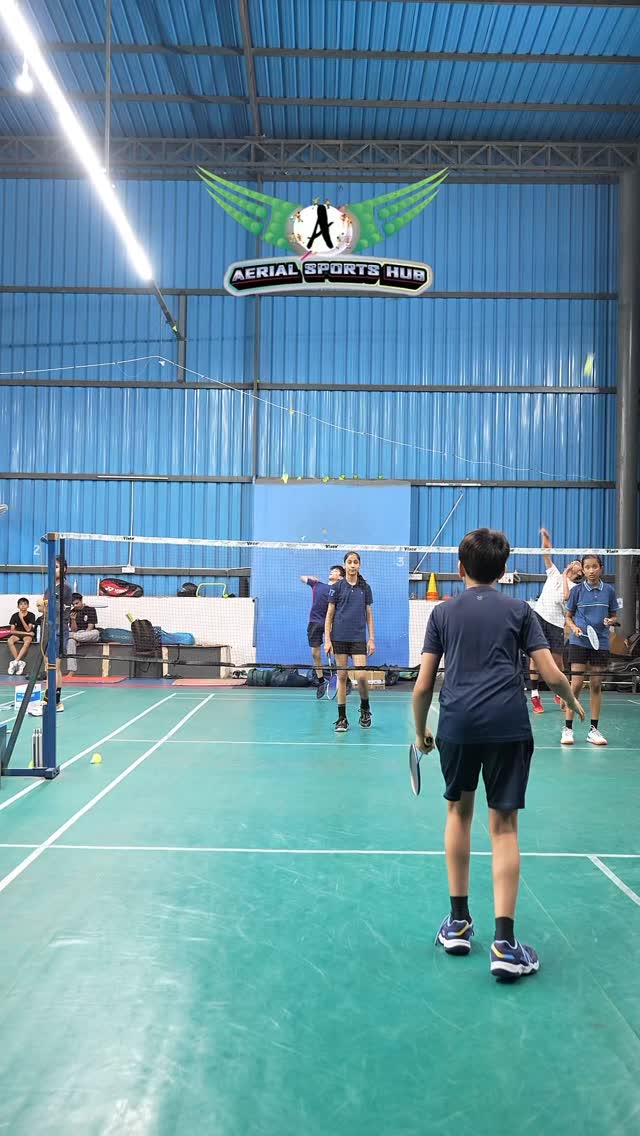 Evening badminton session on the indoor courts at Aerial Sports Hub