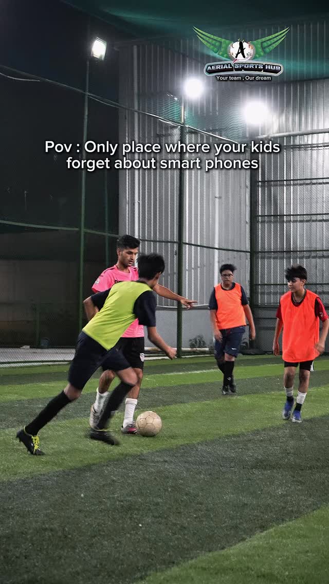 Kids playing football on the turf at Aerial Sports Hub